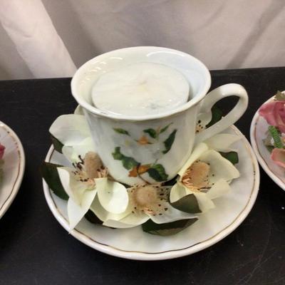 Three Tea Cups Candles With Flowers.