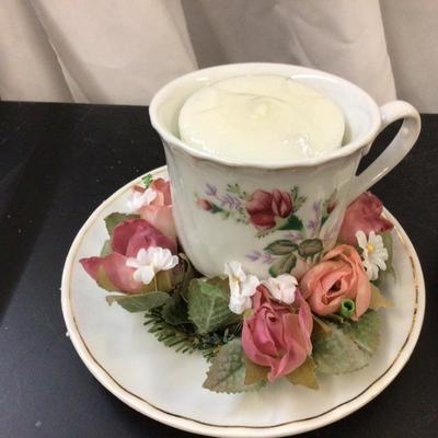 Three Tea Cups Candles With Flowers.