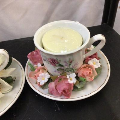 Three Tea Cups Candles With Flowers.