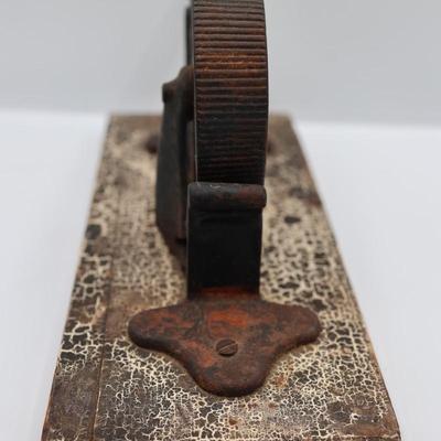 Mechanical Cast Iron Cork Press Tool Mounted on Wooden Plank