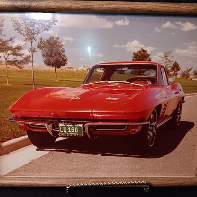 FRAMED CAR ADVERTISEMENT, 2 PHOTOS OF A CORVETTE AND A AUTO RACING YEARBOOK