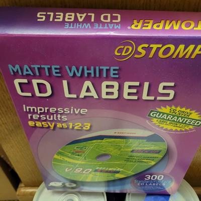 Lot of recordable CDs and DVDs l, labels and jewels
