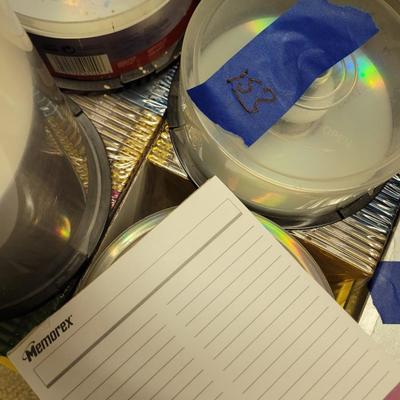 Lot of recordable CDs and DVDs l, labels and jewels