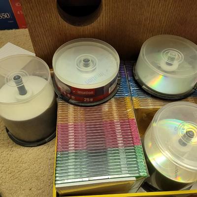 Lot of recordable CDs and DVDs l, labels and jewels