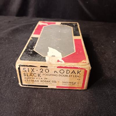 SIX-20 KODAK BLACK FOLDING CAMERA WITH FOCUSING DOUBLET LENS
