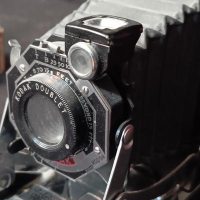 SIX-20 KODAK BLACK FOLDING CAMERA WITH FOCUSING DOUBLET LENS