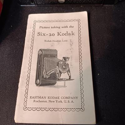 SIX-20 KODAK BLACK FOLDING CAMERA WITH FOCUSING DOUBLET LENS