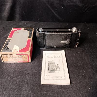 SIX-20 KODAK BLACK FOLDING CAMERA WITH FOCUSING DOUBLET LENS