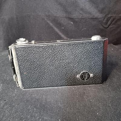 SIX-20 KODAK BLACK FOLDING CAMERA WITH FOCUSING DOUBLET LENS