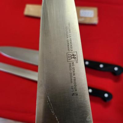 8 Assorted J.A. Henckels Knives