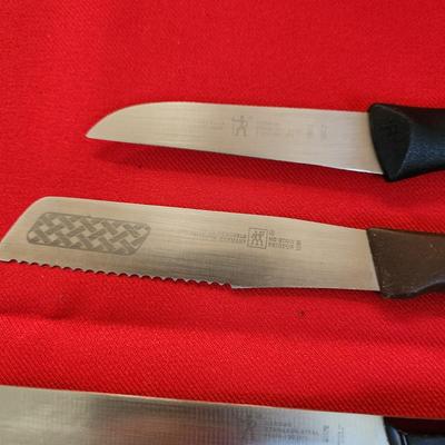 8 Assorted J.A. Henckels Knives