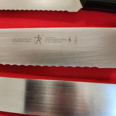 8 Assorted J.A. Henckels Knives