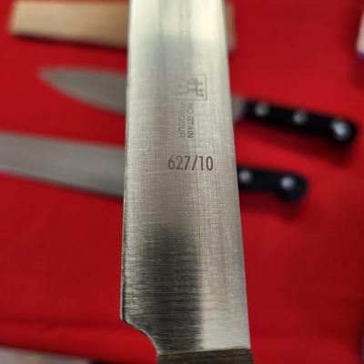 8 Assorted J.A. Henckels Knives