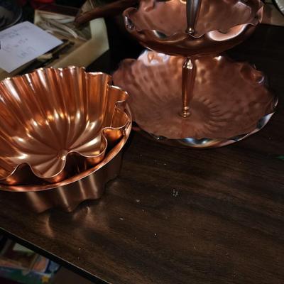 Five copper jello molds and candy dish