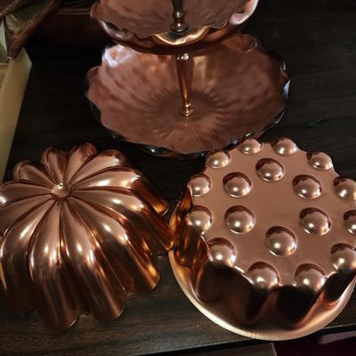 Five copper jello molds and candy dish