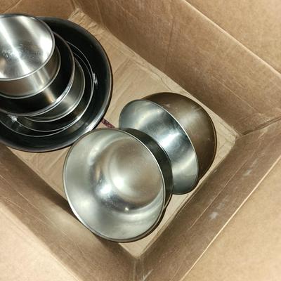 Multiple stainless bowls.