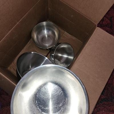 Multiple stainless bowls.
