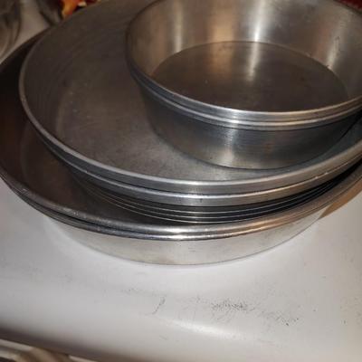 Box of baking sheets with shapes and more.