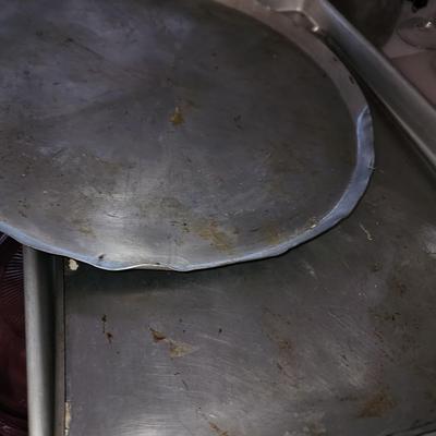 Box of baking sheets with shapes and more.