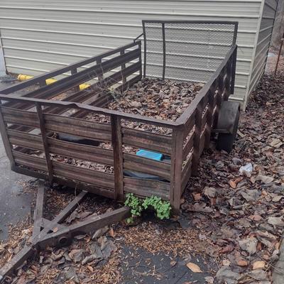 Pull Behind Trailer with Wood Floor and Metal Sides Flip Gate