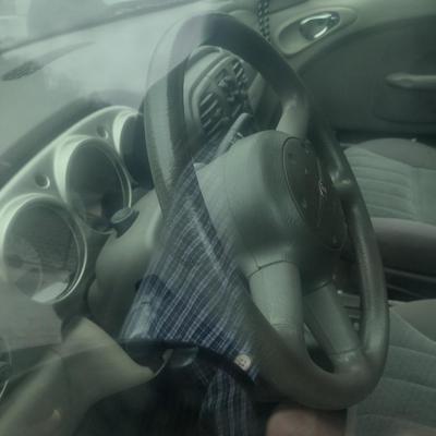 Chrysler PT Cruiser Four Door with Keys and Title (For Parts Only Condition)
