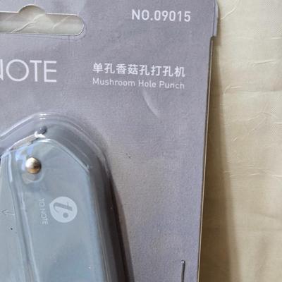 New in the Package Mushroom Hole Punch