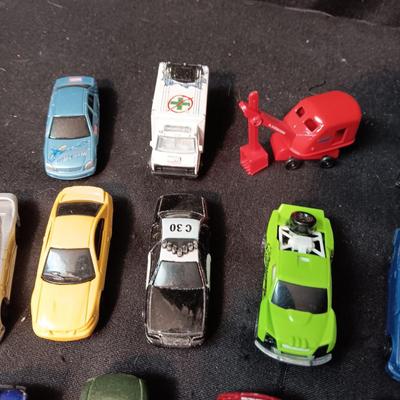 A COLLECTION OF MAISTO TOY CARS