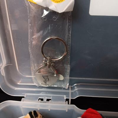 PLASTIC STORAGE CONTAINER FILLED WITH UNIQUE KEYCHAINS