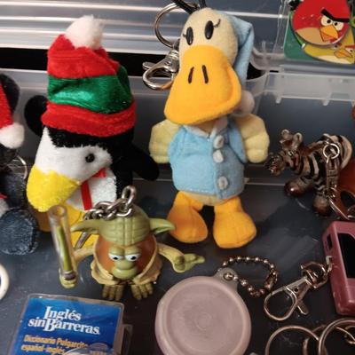 PLASTIC STORAGE CONTAINER FILLED WITH UNIQUE KEYCHAINS