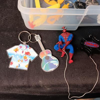 PLASTIC STORAGE CONTAINER FILLED WITH UNIQUE KEYCHAINS