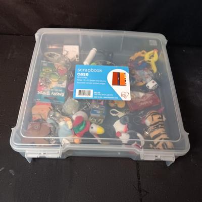 PLASTIC STORAGE CONTAINER FILLED WITH UNIQUE KEYCHAINS