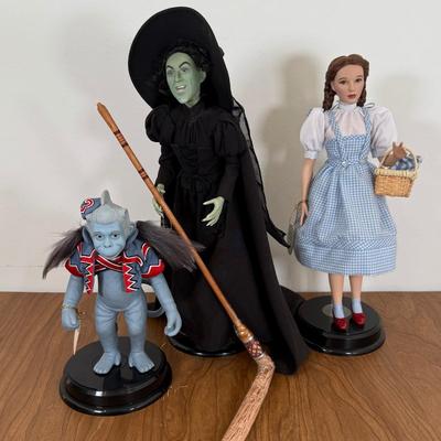 LOT 18A: Mattel Timeless Treasures Wizard of Oz 14" Porcelain Dolls - Wicked Witch of the West, Judy Garland as Dorothy & Winged...