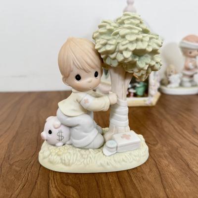 LOT 28B: Precious Moments Porcelain Statues - Disney Mouseketeer, Christmas & Retired 'Money's Not the Only Thing Worth...