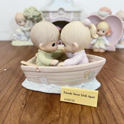 LOT 28B: Precious Moments Porcelain Statues - Disney Mouseketeer, Christmas & Retired 'Money's Not the Only Thing Worth...