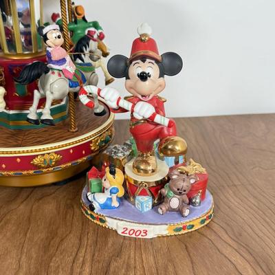 LOT 40B: Disney Mr. Christmas Mickey Holiday Go Round & Porcelain 2003 Mickey Santa Statue