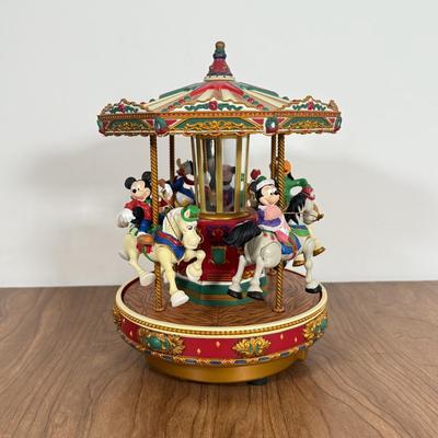 LOT 40B: Disney Mr. Christmas Mickey Holiday Go Round & Porcelain 2003 Mickey Santa Statue