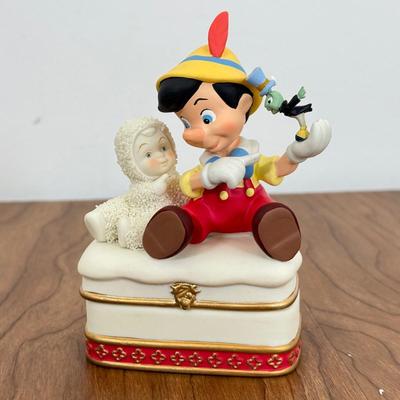 LOT 45B: Disney Department 56 w/ Boxes - North Pole Series Scrooge McDuck & Marley's Counting House, Pinocchio & Minnie...