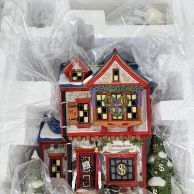 LOT 45B: Disney Department 56 w/ Boxes - North Pole Series Scrooge McDuck & Marley's Counting House, Pinocchio & Minnie...