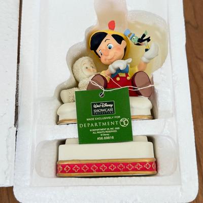 LOT 45B: Disney Department 56 w/ Boxes - North Pole Series Scrooge McDuck & Marley's Counting House, Pinocchio & Minnie...