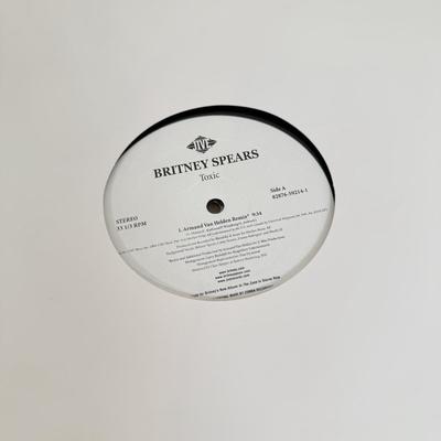 LOT 49B: Vinyl Record Collection w/ Metal Magazine Rack - Mariah Carey, Britney Spears, Gwen Stefani, Beyonce & More