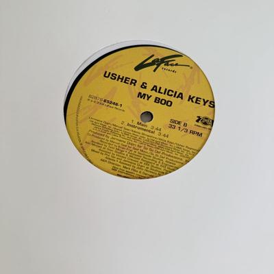 LOT 49B: Vinyl Record Collection w/ Metal Magazine Rack - Mariah Carey, Britney Spears, Gwen Stefani, Beyonce & More