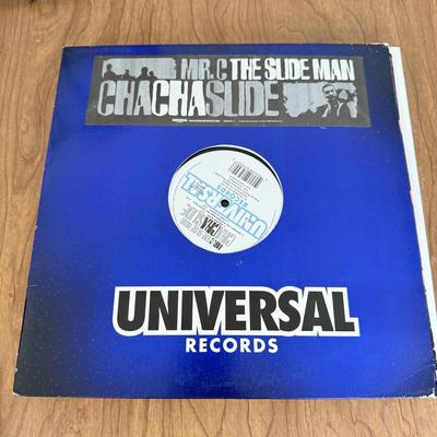 LOT 49B: Vinyl Record Collection w/ Metal Magazine Rack - Mariah Carey, Britney Spears, Gwen Stefani, Beyonce & More