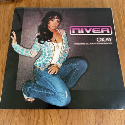 LOT 49B: Vinyl Record Collection w/ Metal Magazine Rack - Mariah Carey, Britney Spears, Gwen Stefani, Beyonce & More