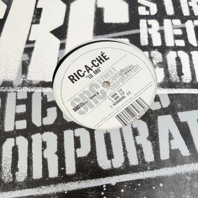 LOT 49B: Vinyl Record Collection w/ Metal Magazine Rack - Mariah Carey, Britney Spears, Gwen Stefani, Beyonce & More