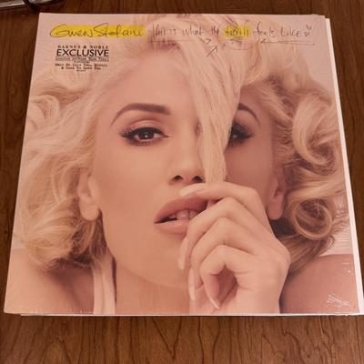 LOT 49B: Vinyl Record Collection w/ Metal Magazine Rack - Mariah Carey, Britney Spears, Gwen Stefani, Beyonce & More