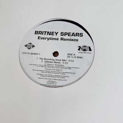 LOT 49B: Vinyl Record Collection w/ Metal Magazine Rack - Mariah Carey, Britney Spears, Gwen Stefani, Beyonce & More