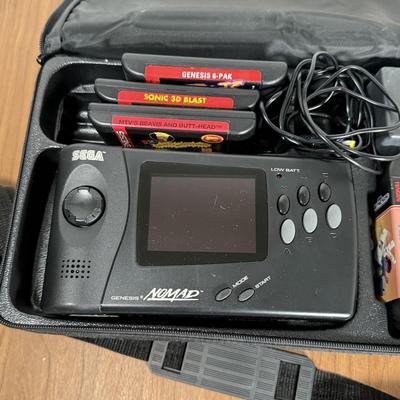 LOT 79B: Vintage Sega Genesis Nomad Video Game System Model MK-6100 w/ 7 Games - Sonic, Pacman, Beavis and Butthead