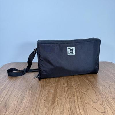 LOT 79B: Vintage Sega Genesis Nomad Video Game System Model MK-6100 w/ 7 Games - Sonic, Pacman, Beavis and Butthead