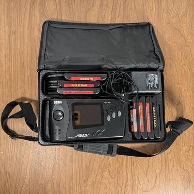 LOT 79B: Vintage Sega Genesis Nomad Video Game System Model MK-6100 w/ 7 Games - Sonic, Pacman, Beavis and Butthead