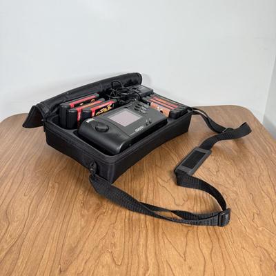 LOT 79B: Vintage Sega Genesis Nomad Video Game System Model MK-6100 w/ 7 Games - Sonic, Pacman, Beavis and Butthead